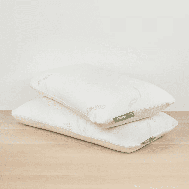 Close-up view of the Heveya Firm Pillow for Side Sleepers. This breathable, 100% natural latex pillow provides firm support and pressure relief for side sleepers.